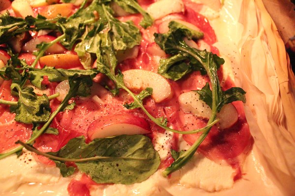 Nectarines and arugula on filo dough